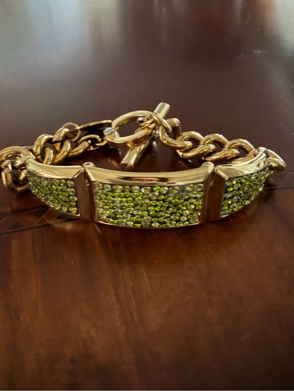 Henri Bendel Gold Tone Bracelet with Green Crystals Toggle Closure 7.5”